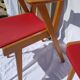 Pair of wooden armchairs and skaï foot compass of the 50s
