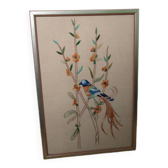 Tableau brodé oiseau bleu et orange