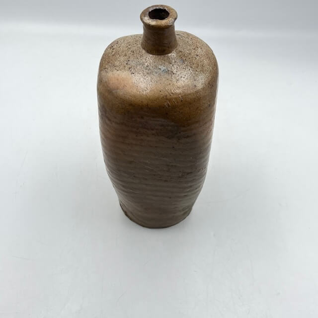 Engraved and square stoneware bottle