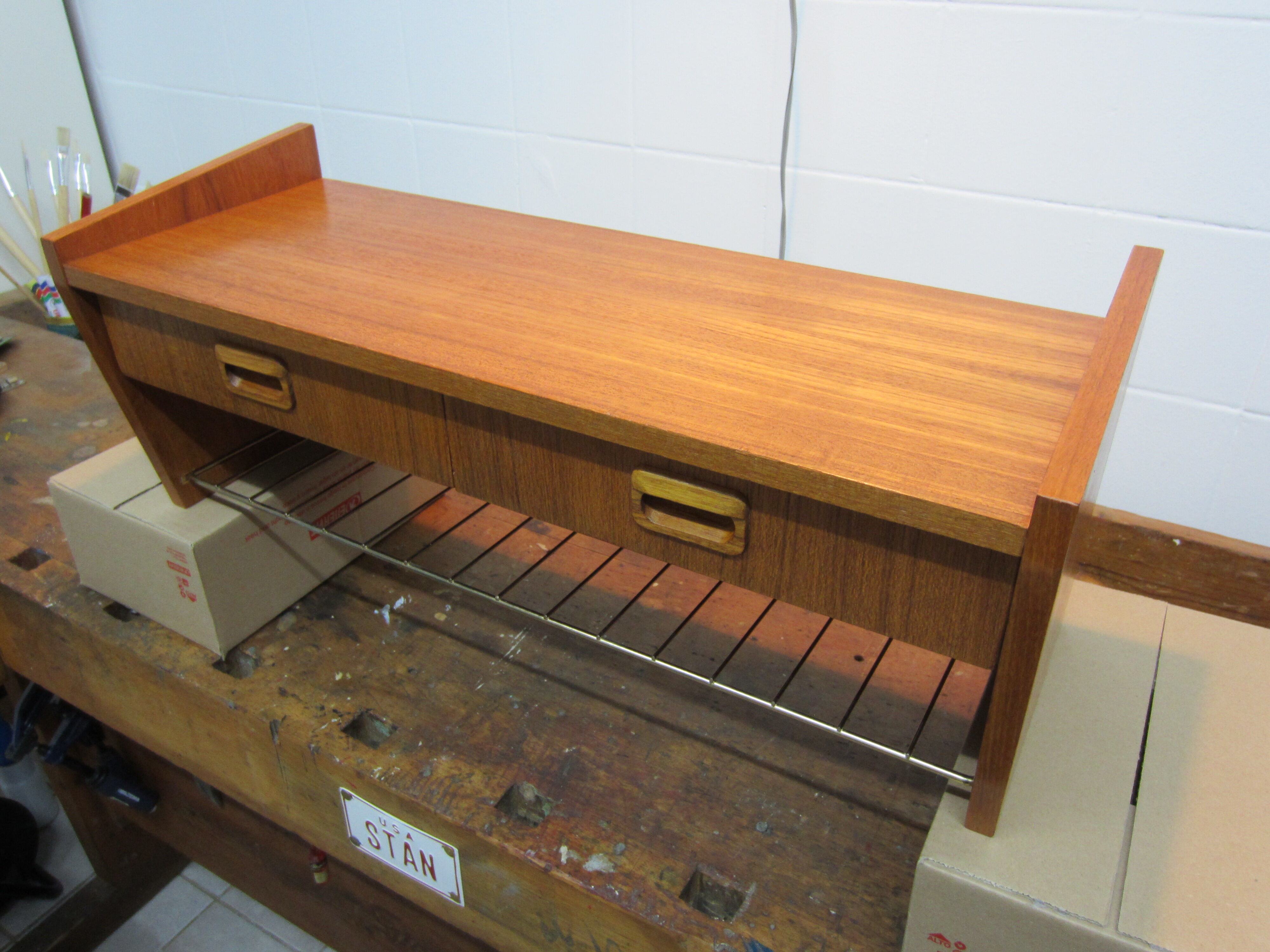 Scandinavian wall shelf in teak