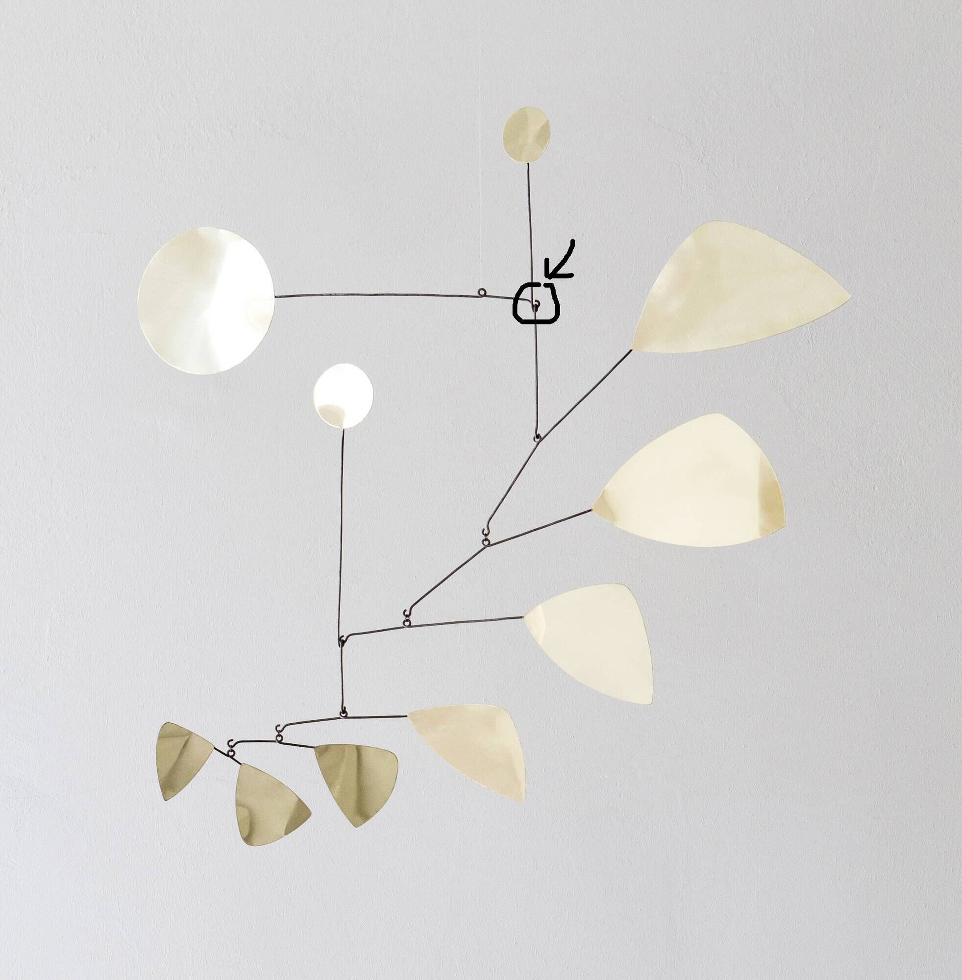 Mobile sculpture in brass and iron
