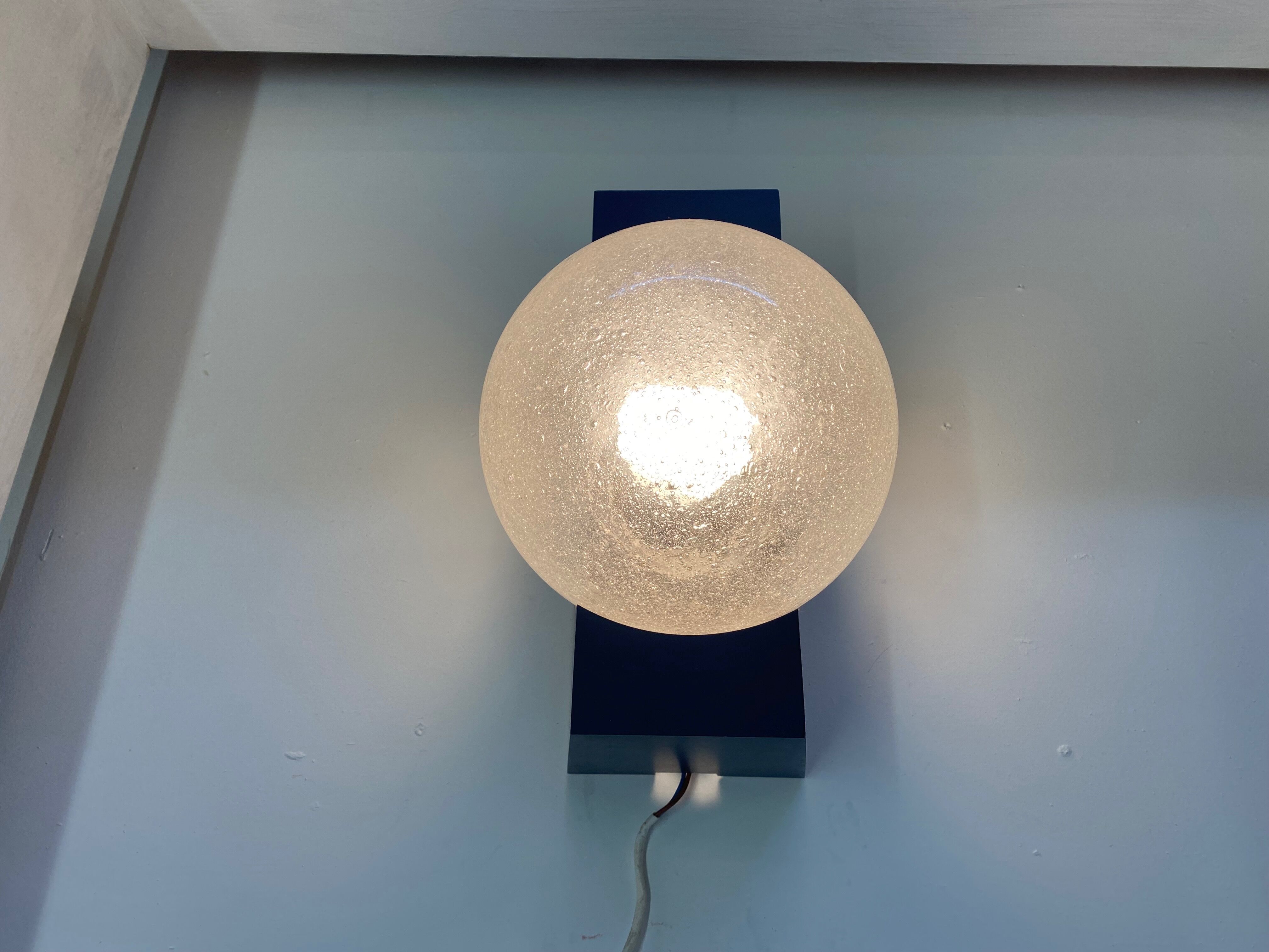 Vintage wall lamp by Raak design 1960