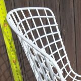 Chairs and footrest by Harry Bertoia