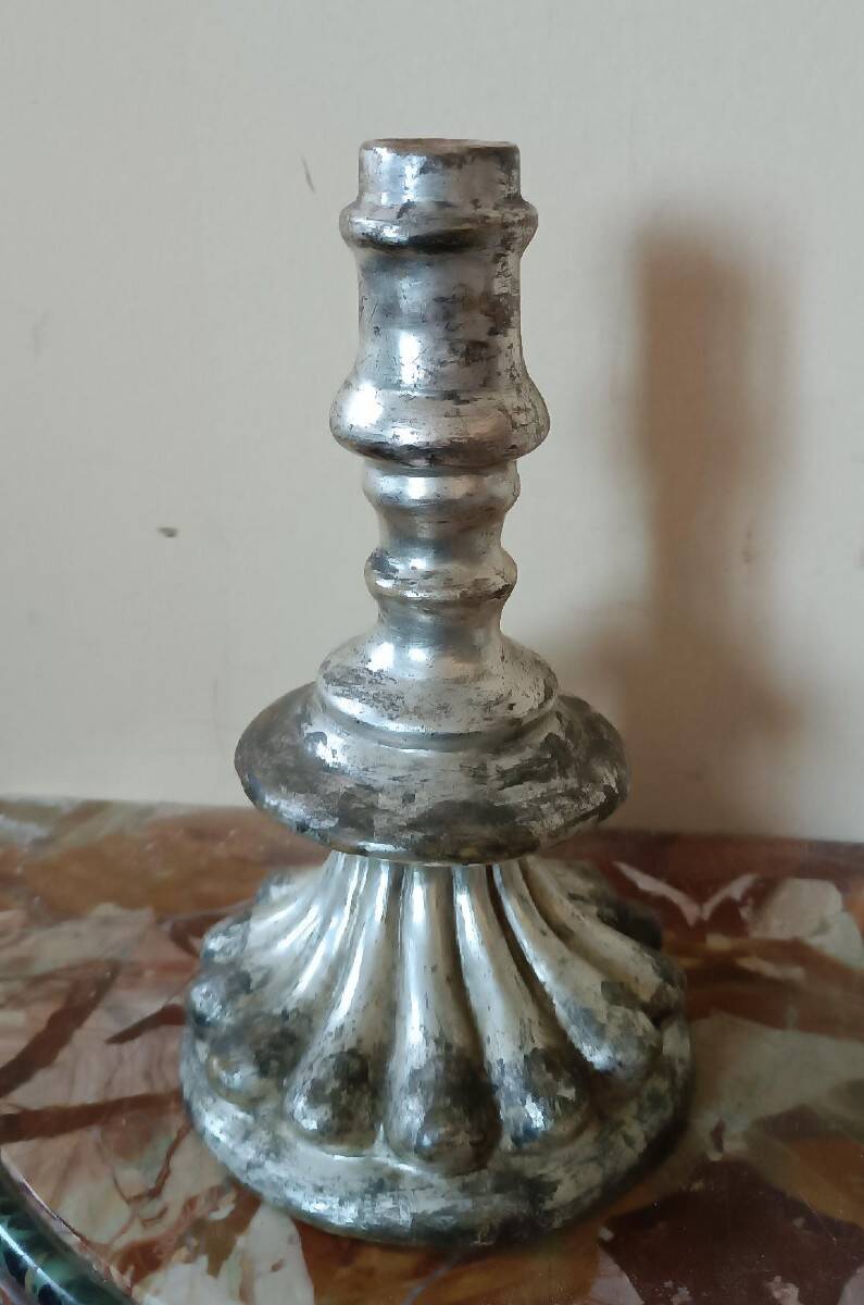 Rare pair of antique silvered terracotta candlesticks from the 17th century.