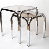 Pair of chrome nesting tables with smoked glass tops