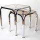 Pair of chrome nesting tables with smoked glass tops
