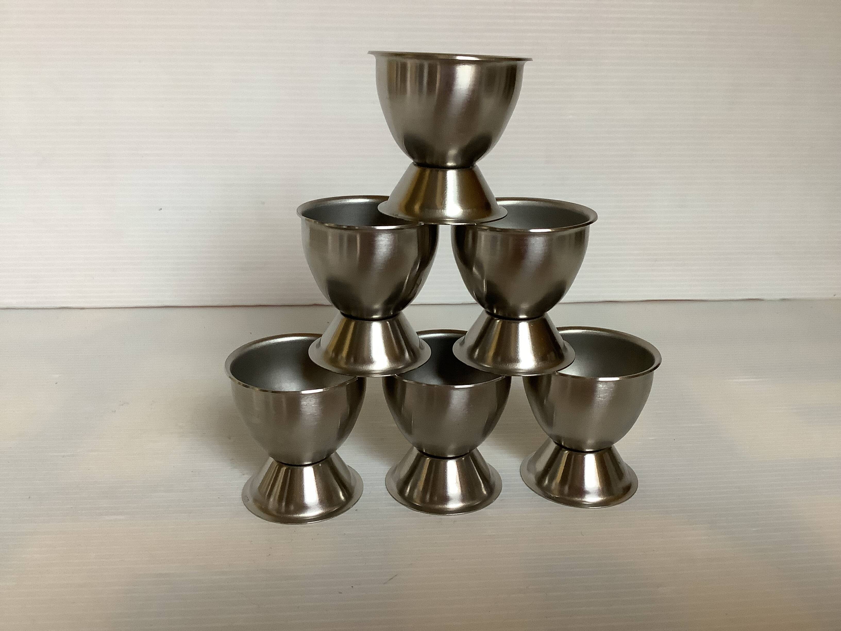 Six metal egg cups