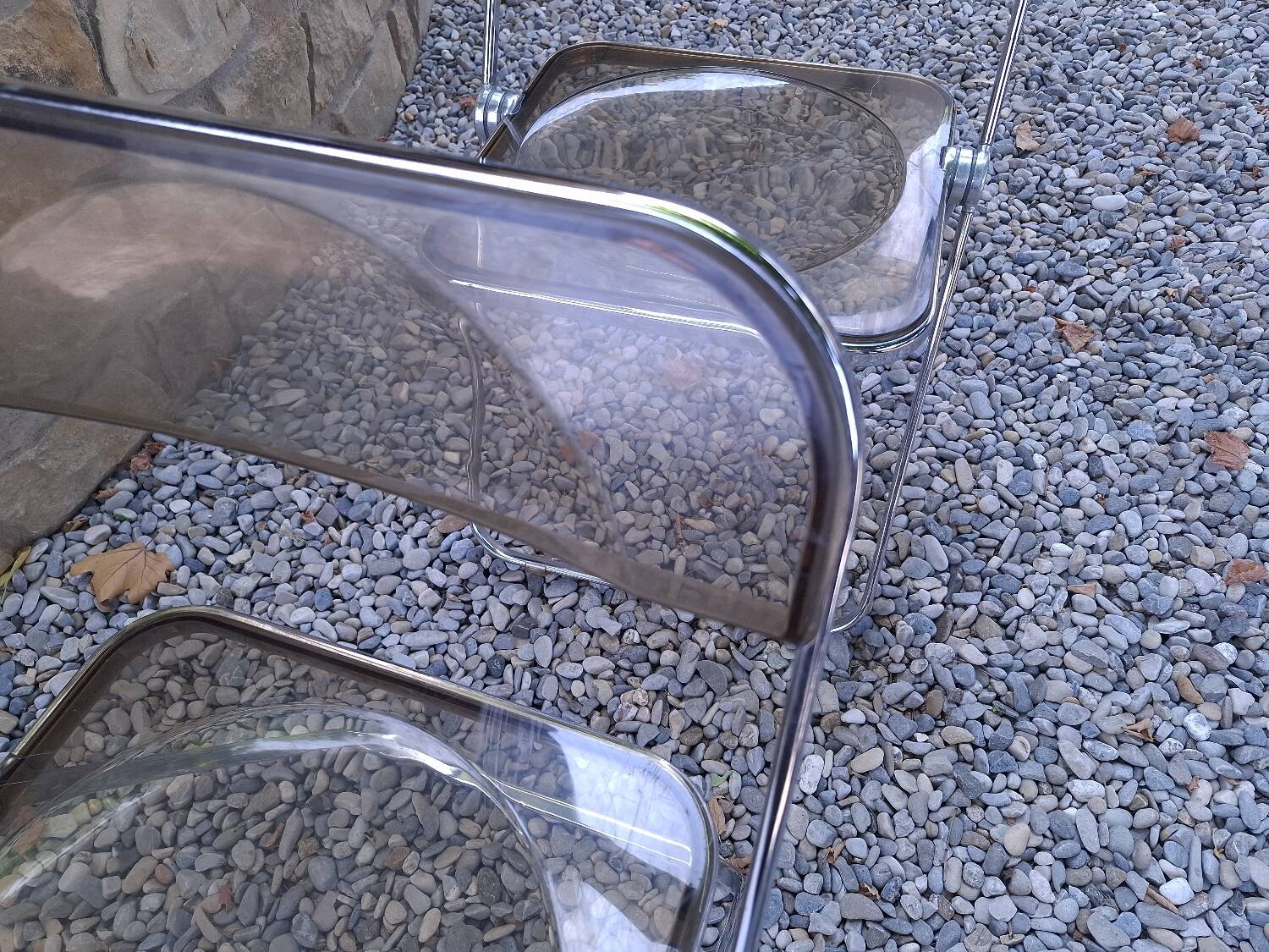 2 folding chairs designed by Giancarlo Piretti for Castelli