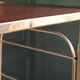 Vinyl record storage unit in gold metal & rosewood formica 1960