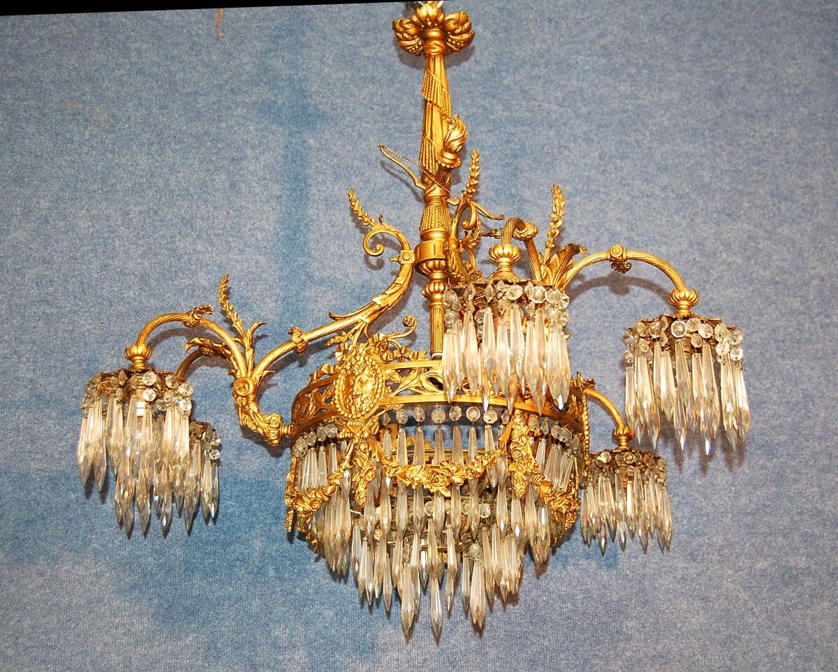 Gilded bronze chandelier and tassels late nineteenth century