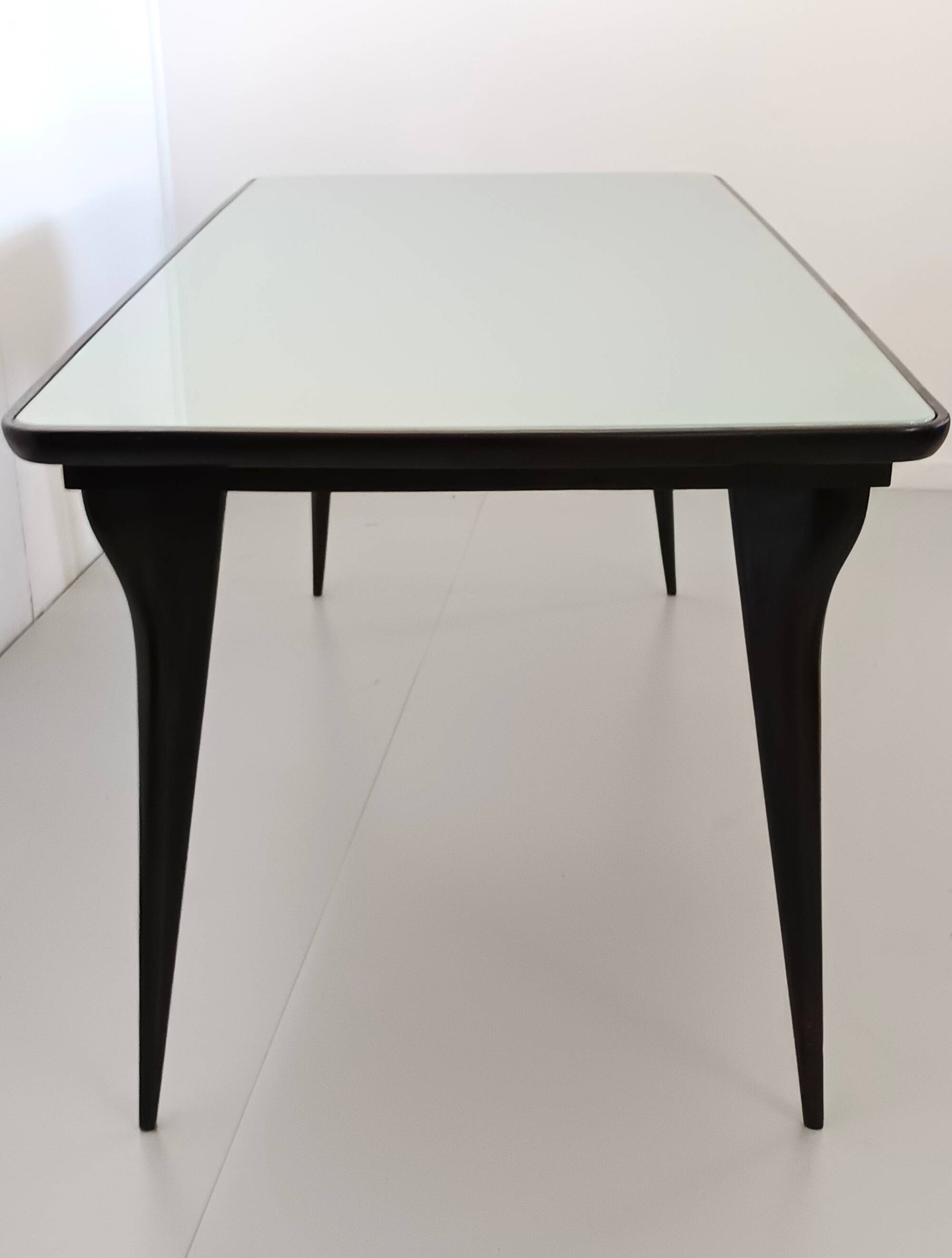 Dining Table with a Pale Green Glass Top