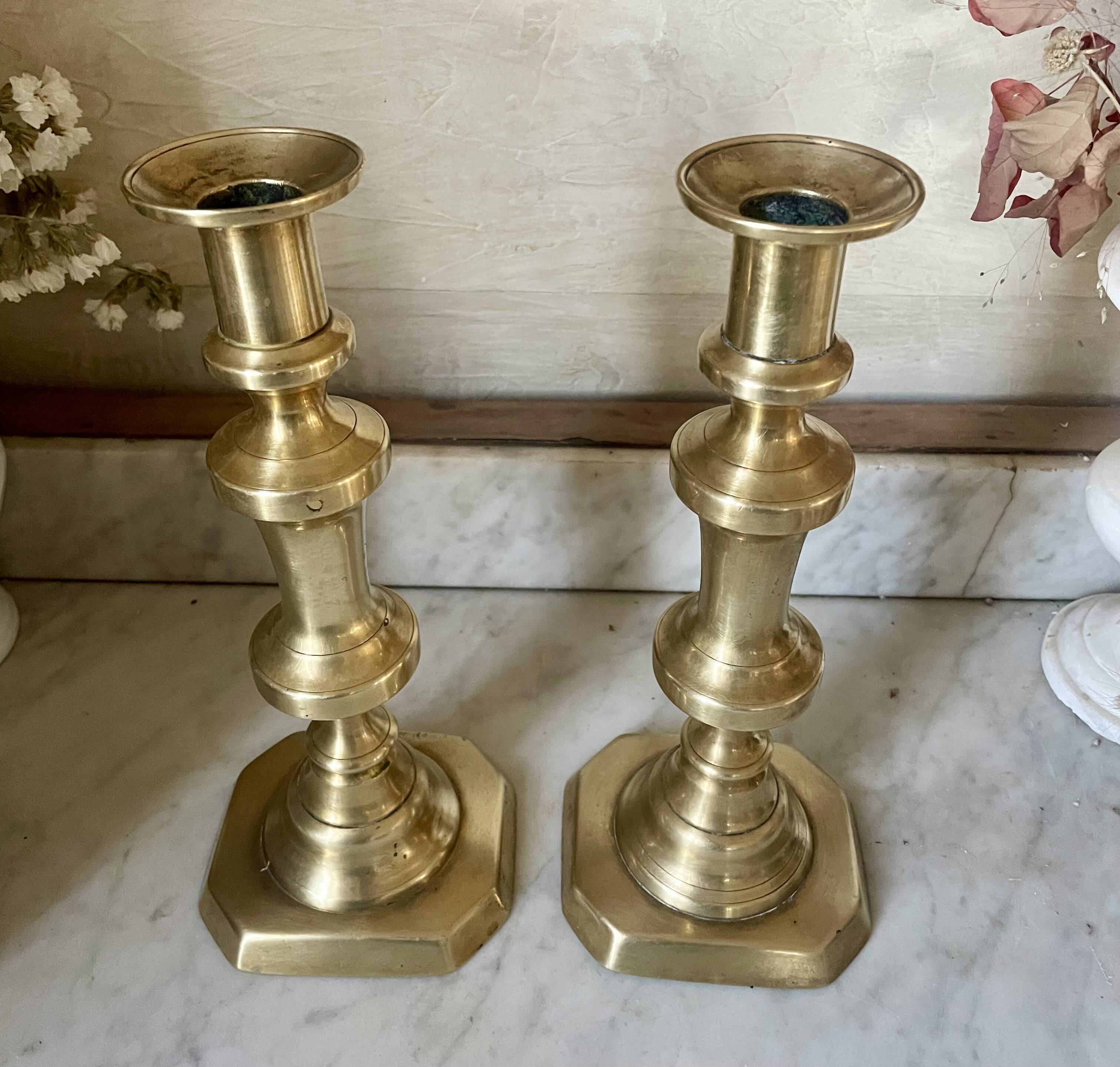 Pair of brass candlesticks from the 19th century.