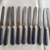 Antique knives blackened wooden handle
