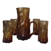 Pitcher and its glasses in amber glass