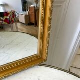 Miroir allongé en stuc doré années 60-70