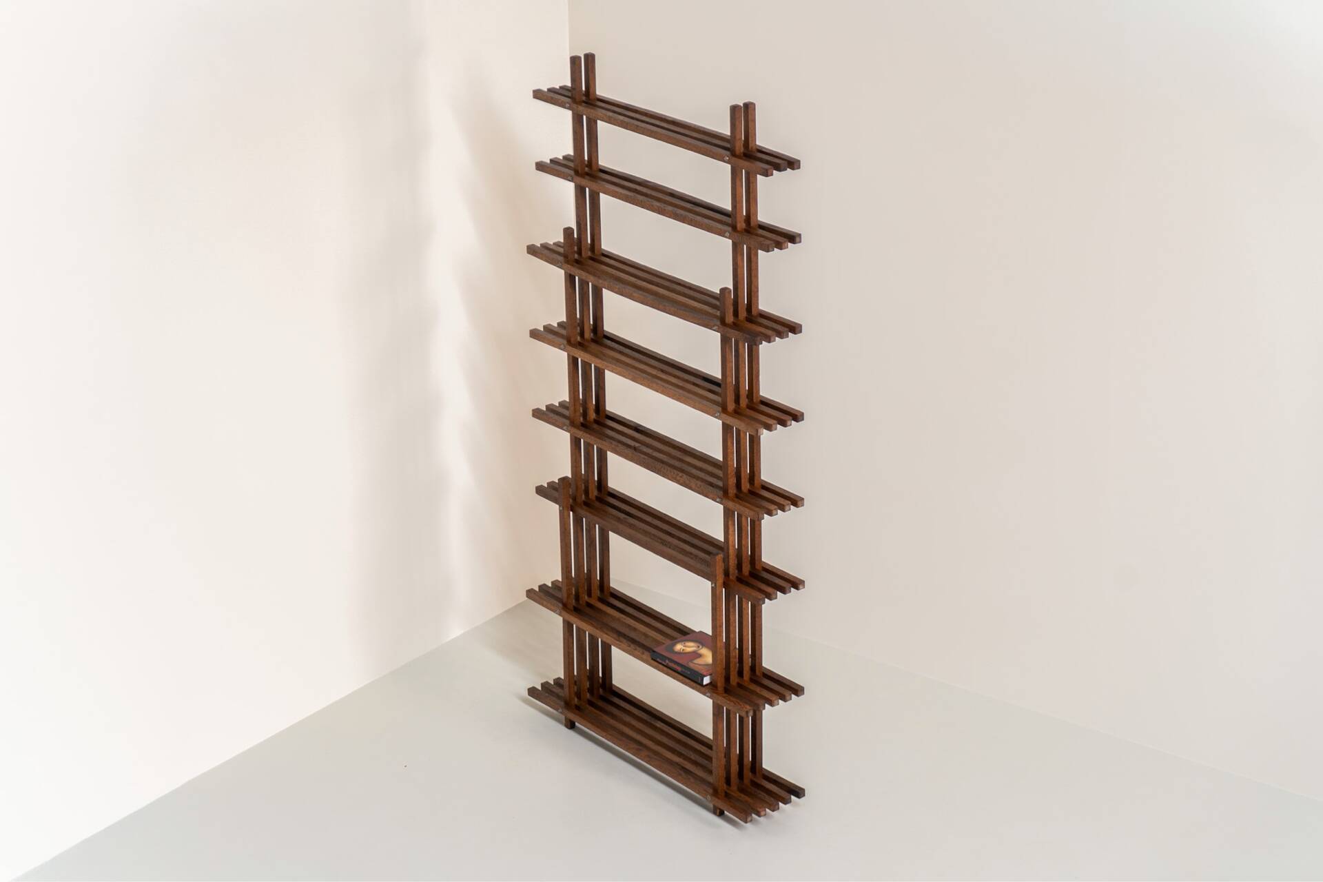 Sculptural wengé slat bookcase (Europe, 1960s).