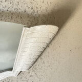 "Arlus" wall light in Art Deco style made of plaster and smoked glass.