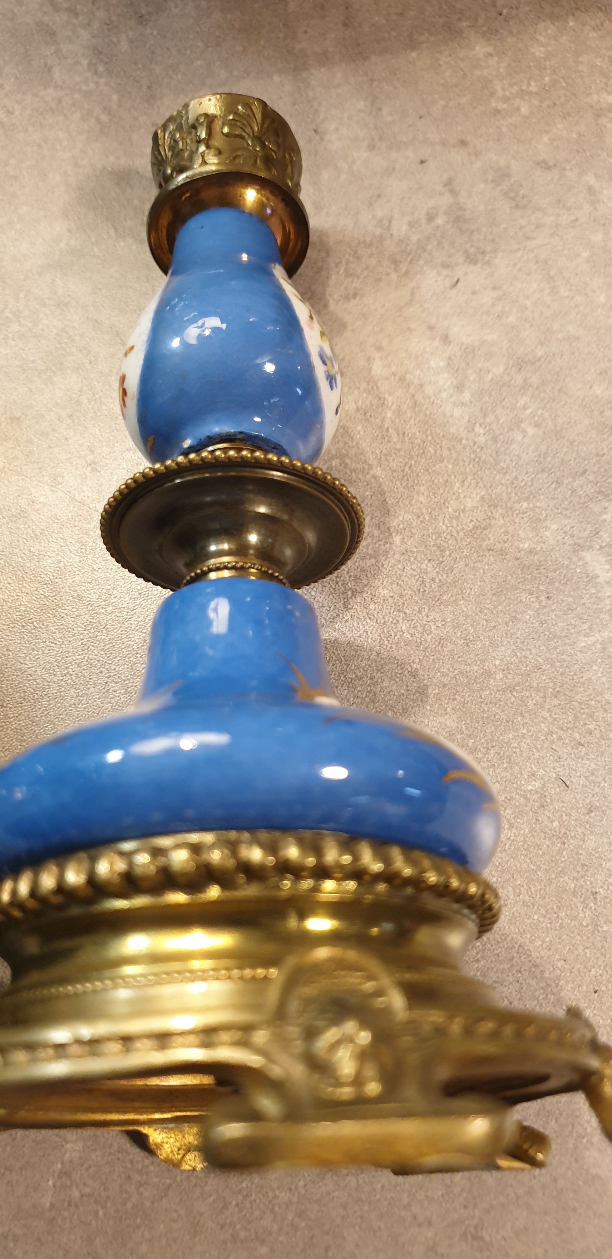 Pair of xixth candle holders, in bronze and enamelled porcelain