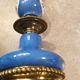 Pair of xixth candle holders, in bronze and enamelled porcelain