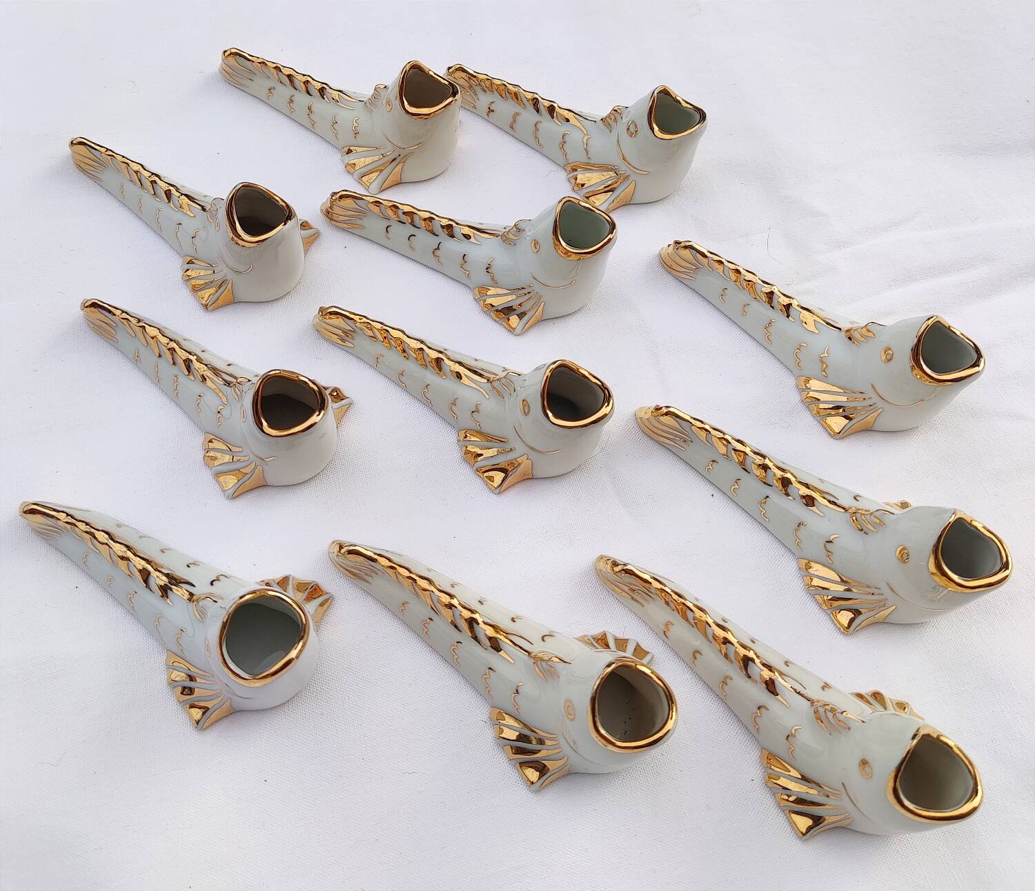 White and gold Limoges porcelain knife rests - animal motif: fish