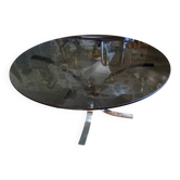 Round coffee table in smoked glass and chrome-plated metal