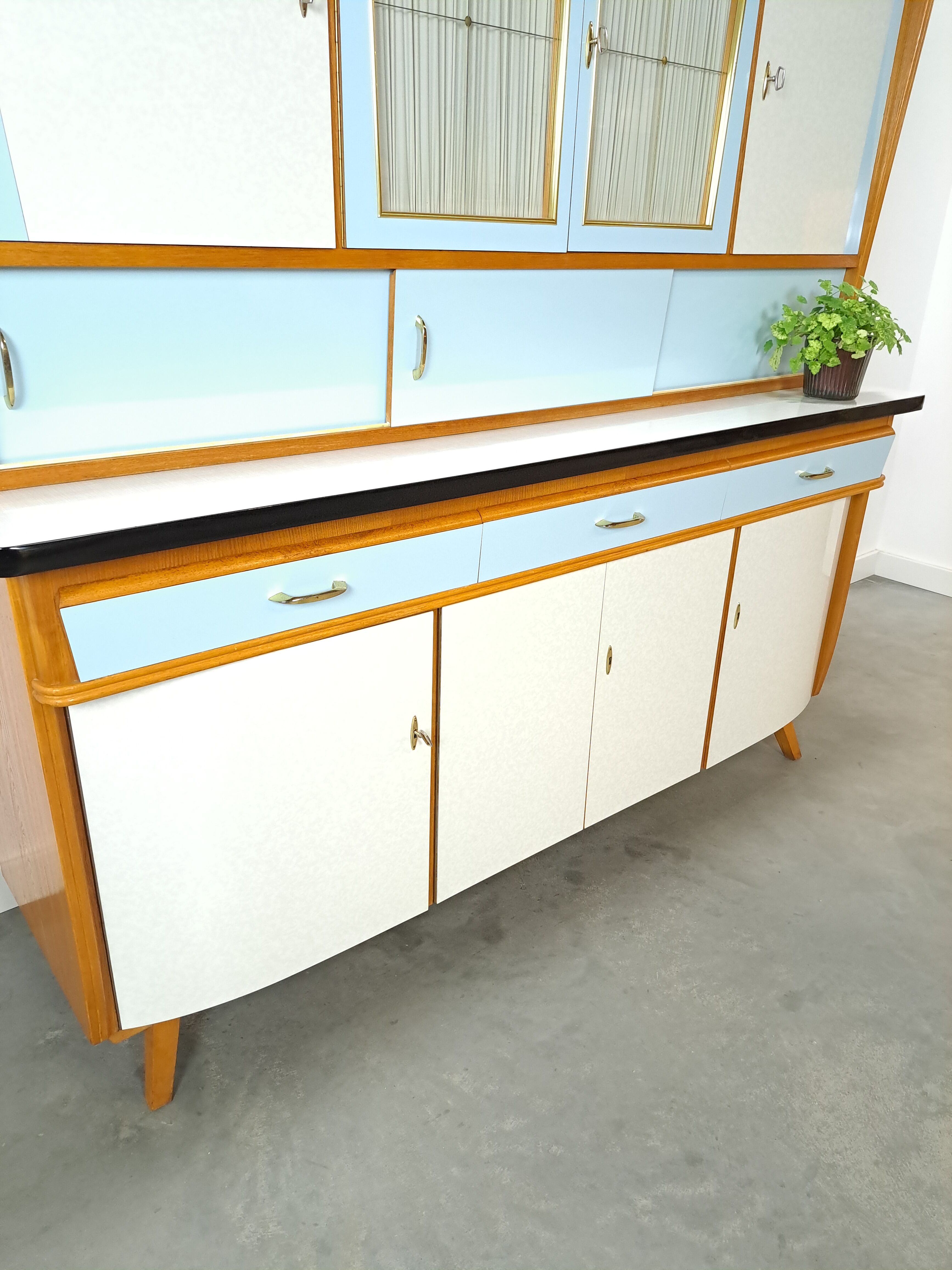 50s vintage kitchen cabinet with brass and formica