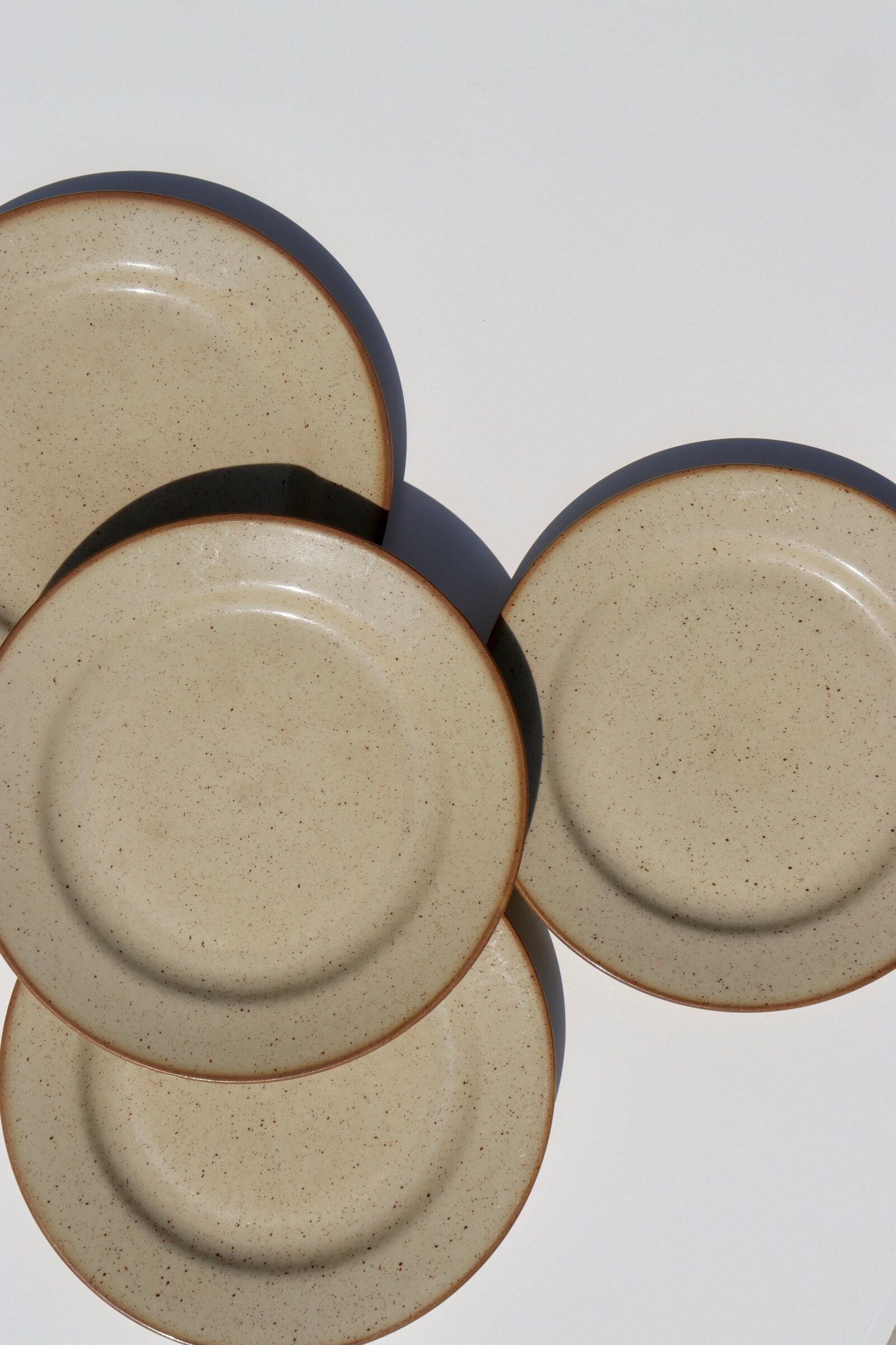 8 plates in speckled Tulowice sandstone