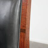 Black Art Deco cowhide leather and wooden design armchair with a high back