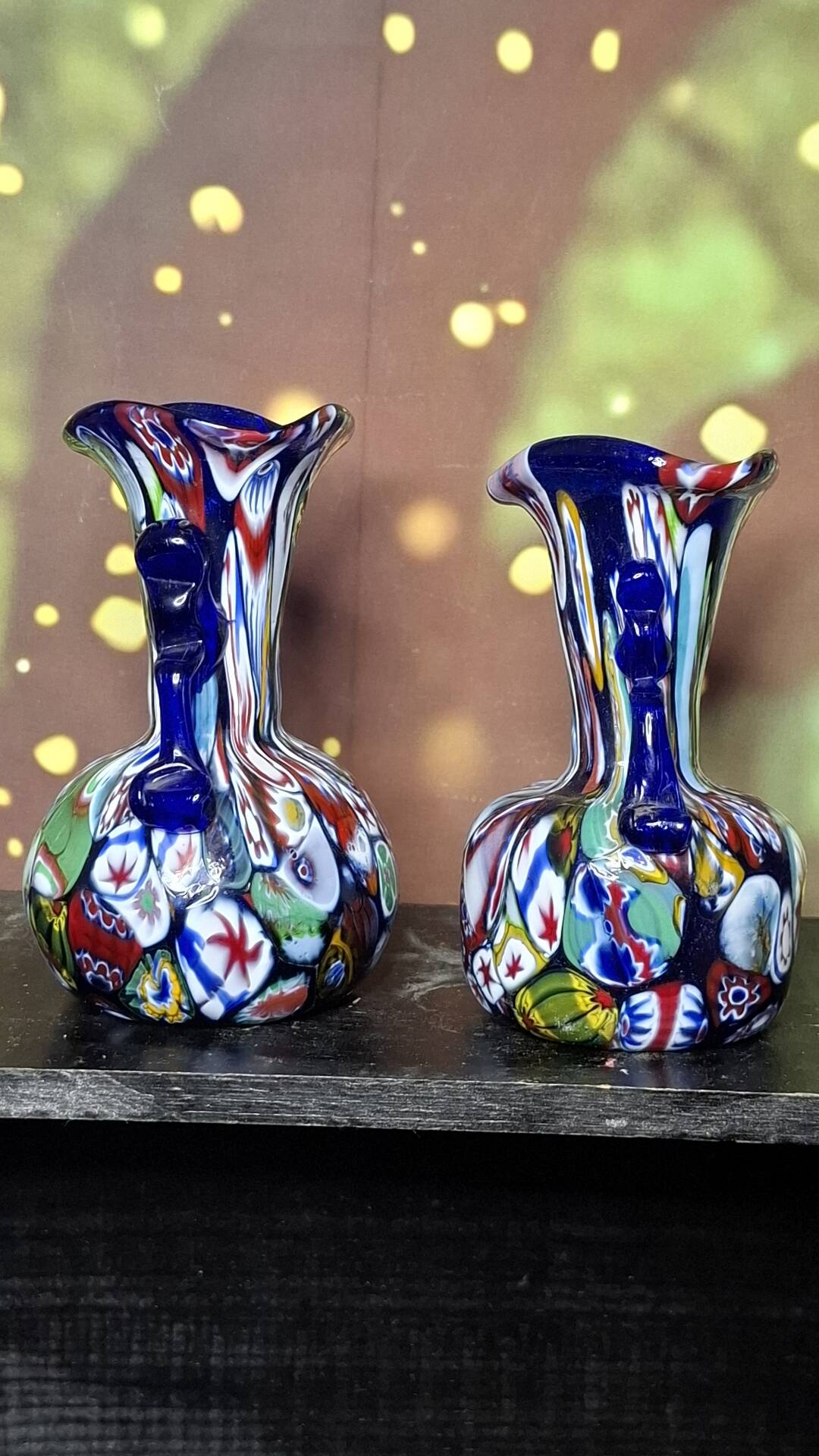 Pair of antique millefiori glass vases attributed to Murano with 2 handles.