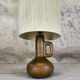 Vintage wooden table lamp with a wool shade.