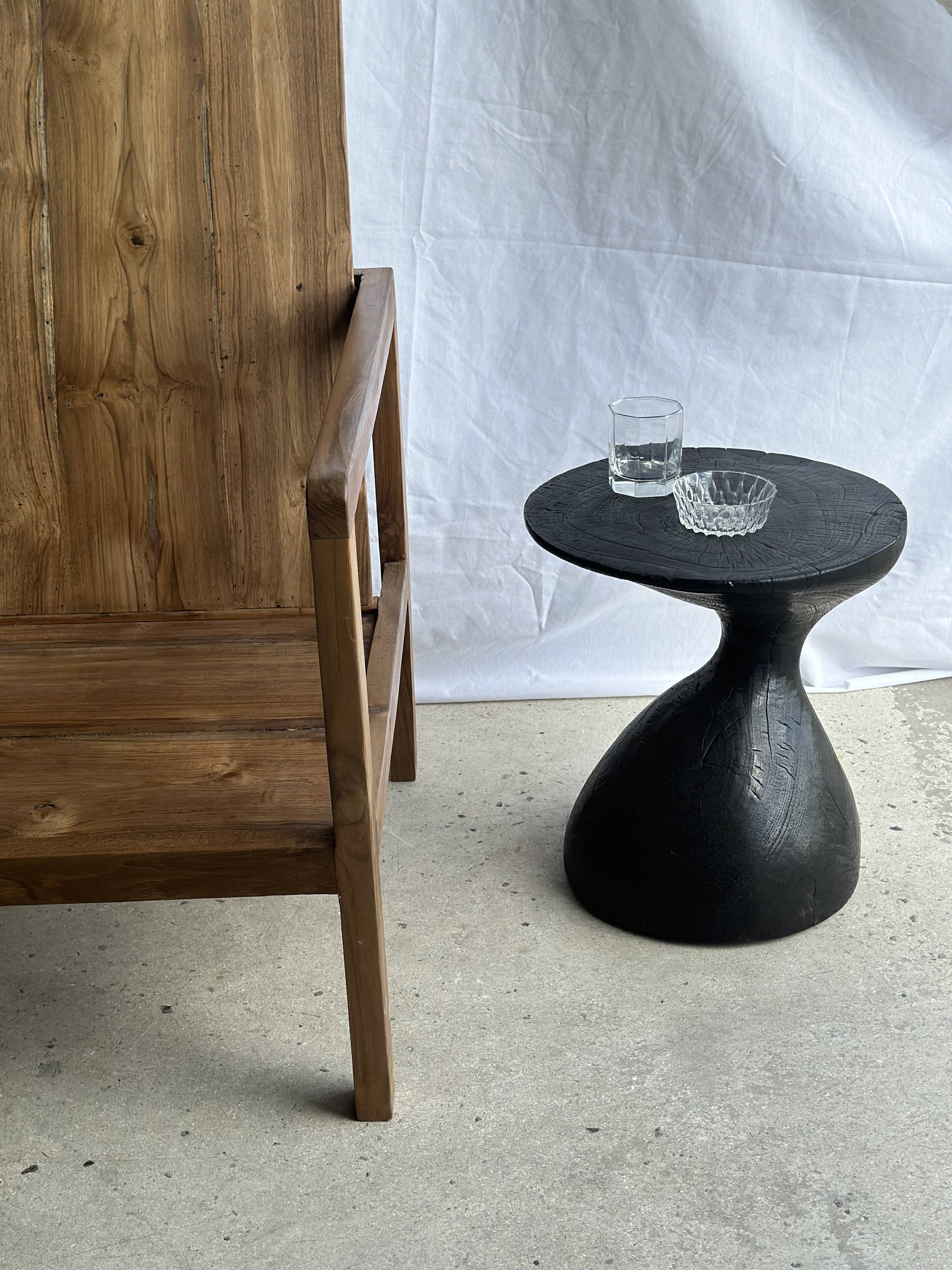 Solid wood (monoxyl) side table, organic shape, black color