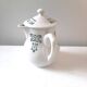 Vintage cream pot with Art Deco pattern and its lid.