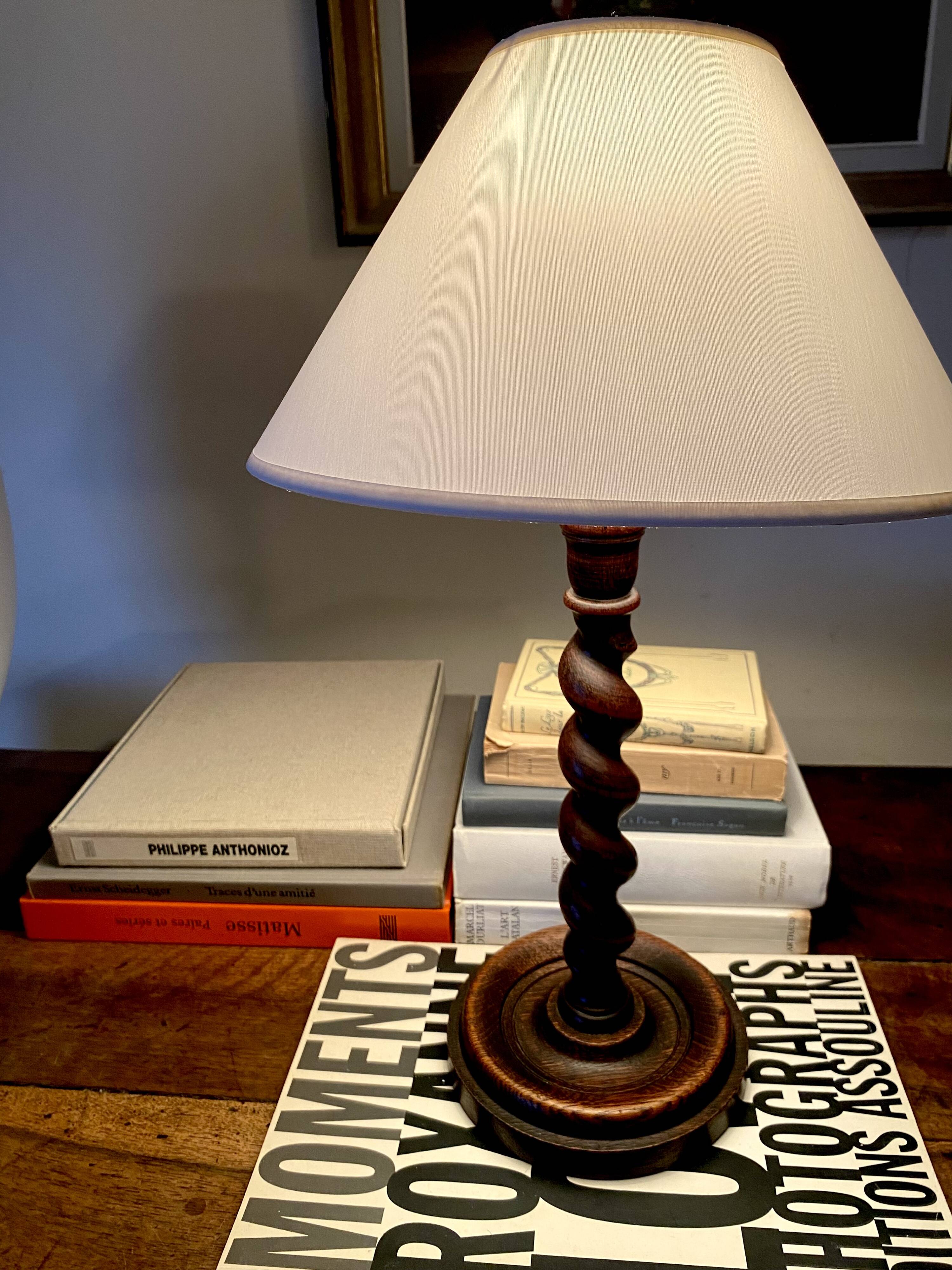 Turned wooden lamp, fabric cable, cotton lampshade.