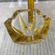 Vintage empty pocket ashtray in yellow chiseled glass or crystal