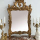 Antique mirror in stuccoed and gilded wood - rocaille style - France 50x86cm