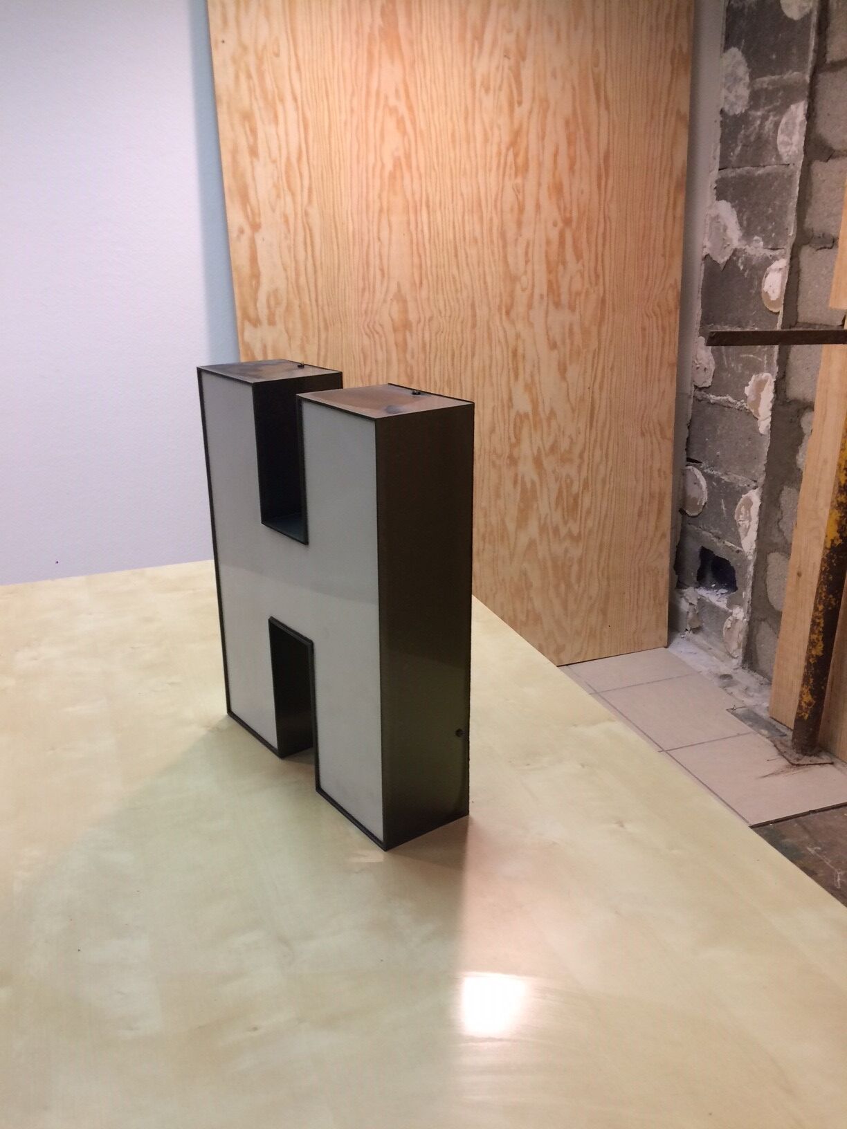 Large metal sign and plexi letter