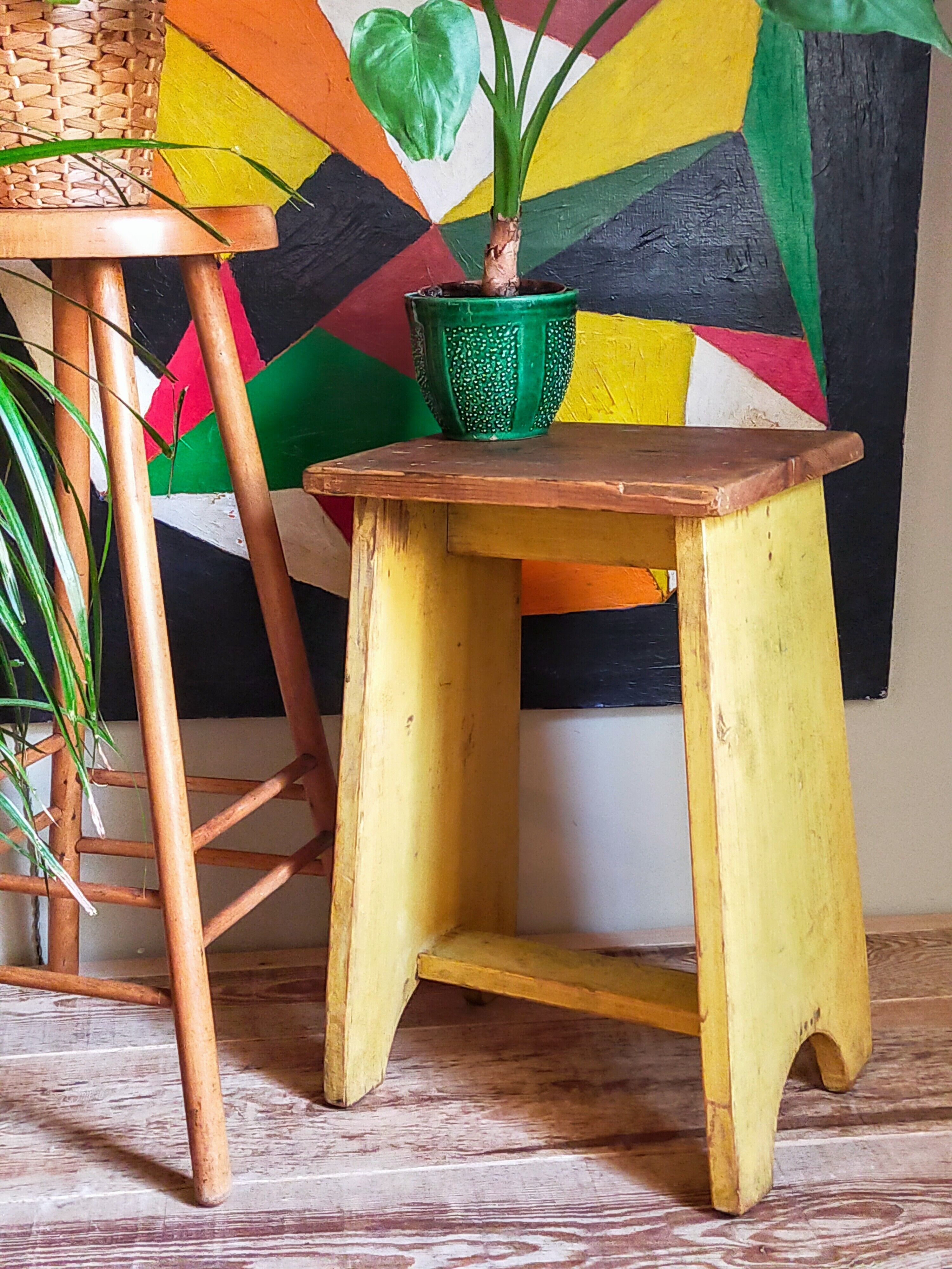 Art-populaire workshop stool in patinated painted wood