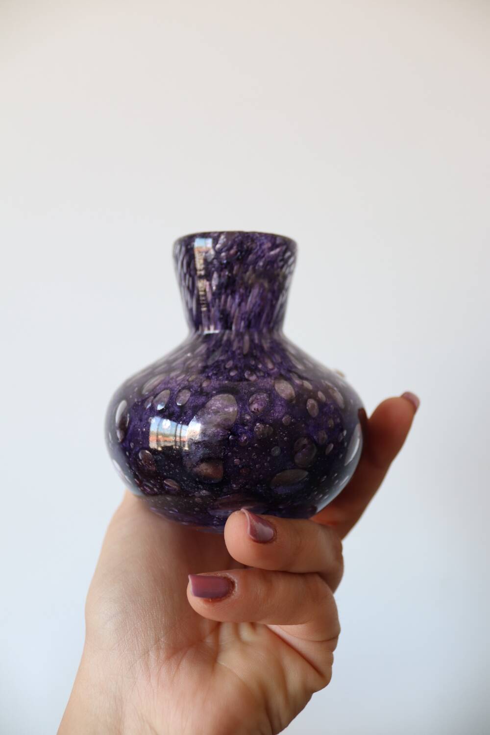 Small purple bubbled and blown glass vase