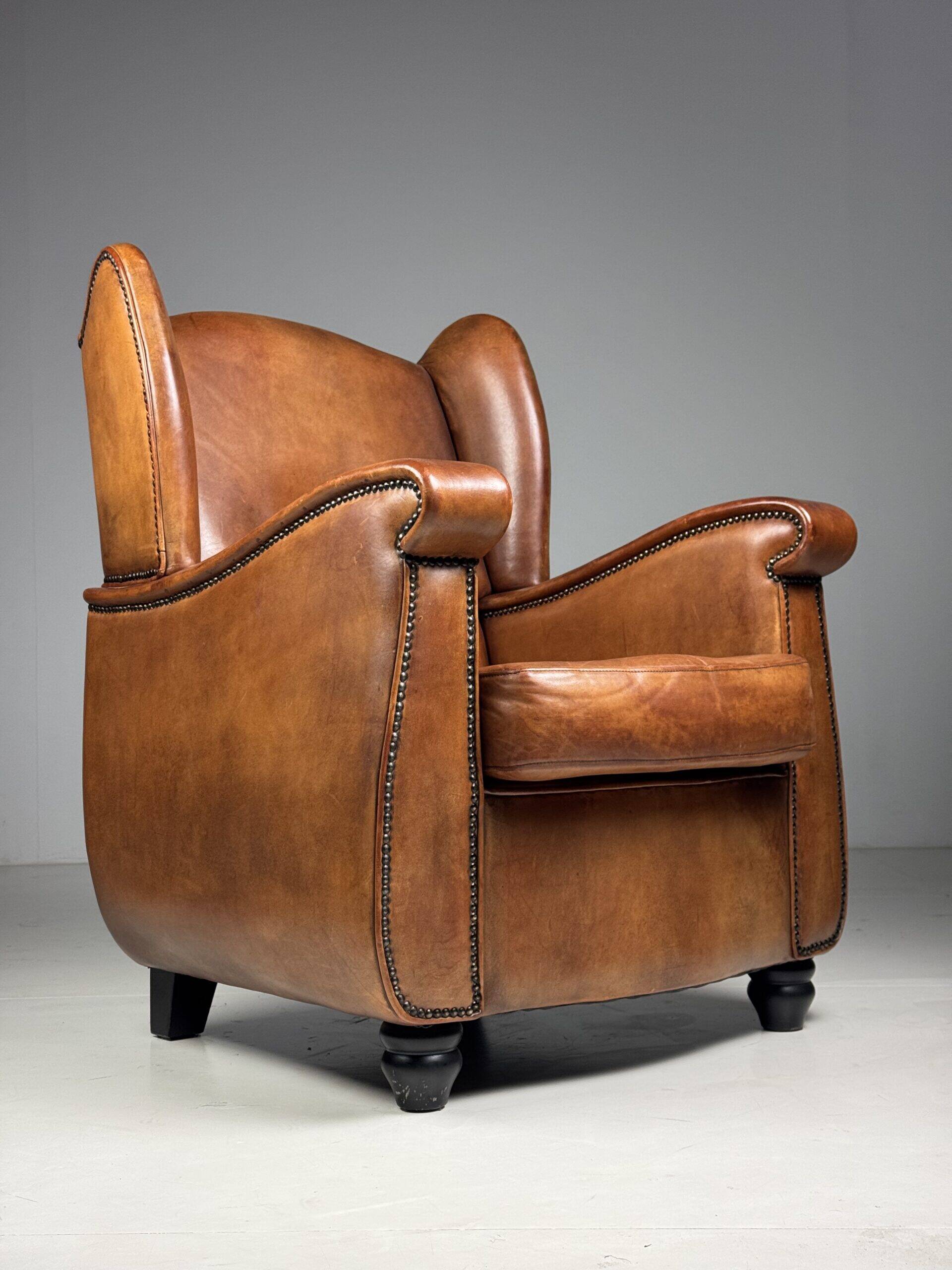 Set of 2 sheepskin club armchairs