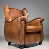 Set of 2 sheepskin club armchairs
