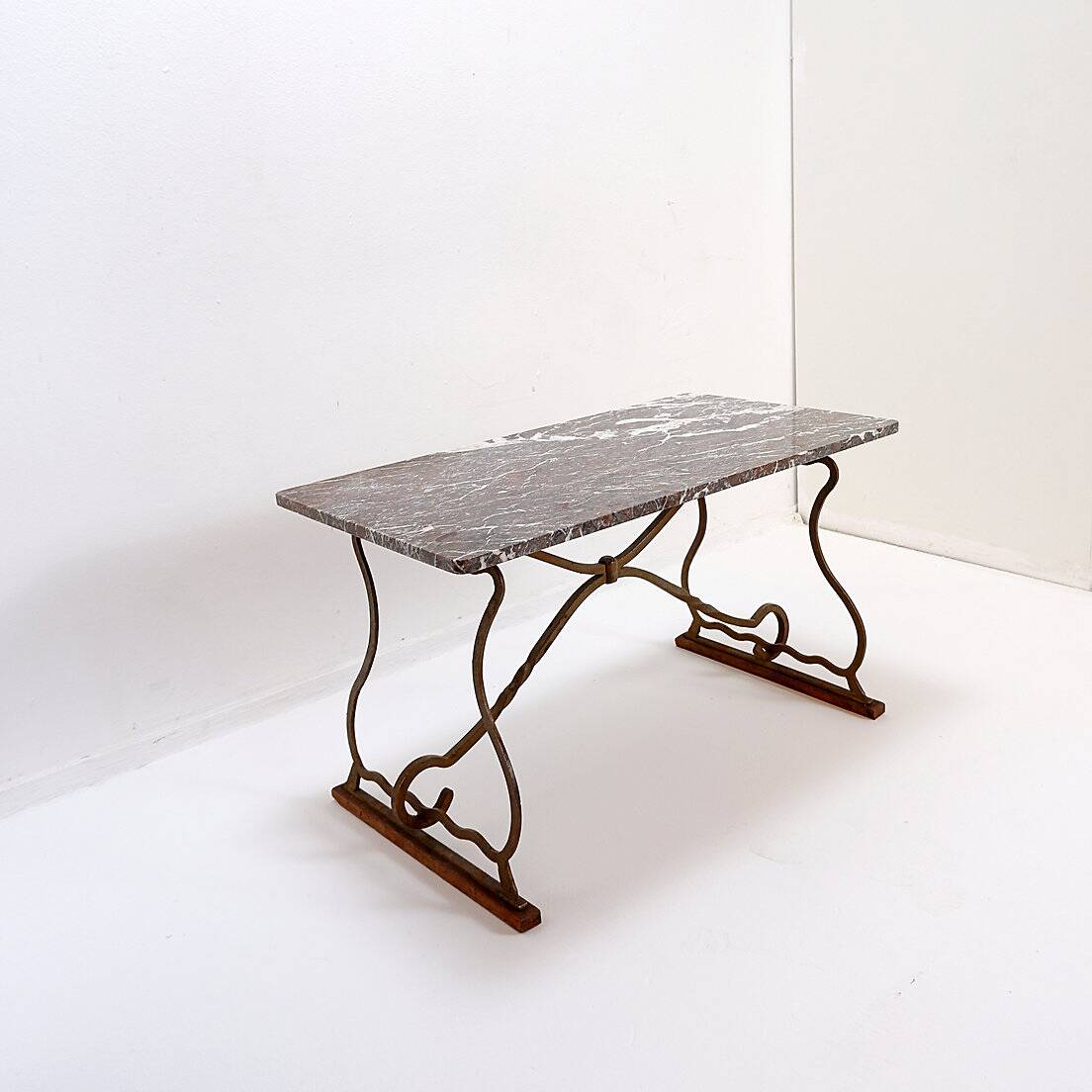 Wrought iron and marble coffee table