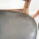 Set of four Arne Vodder chairs in hardwood and black leather.