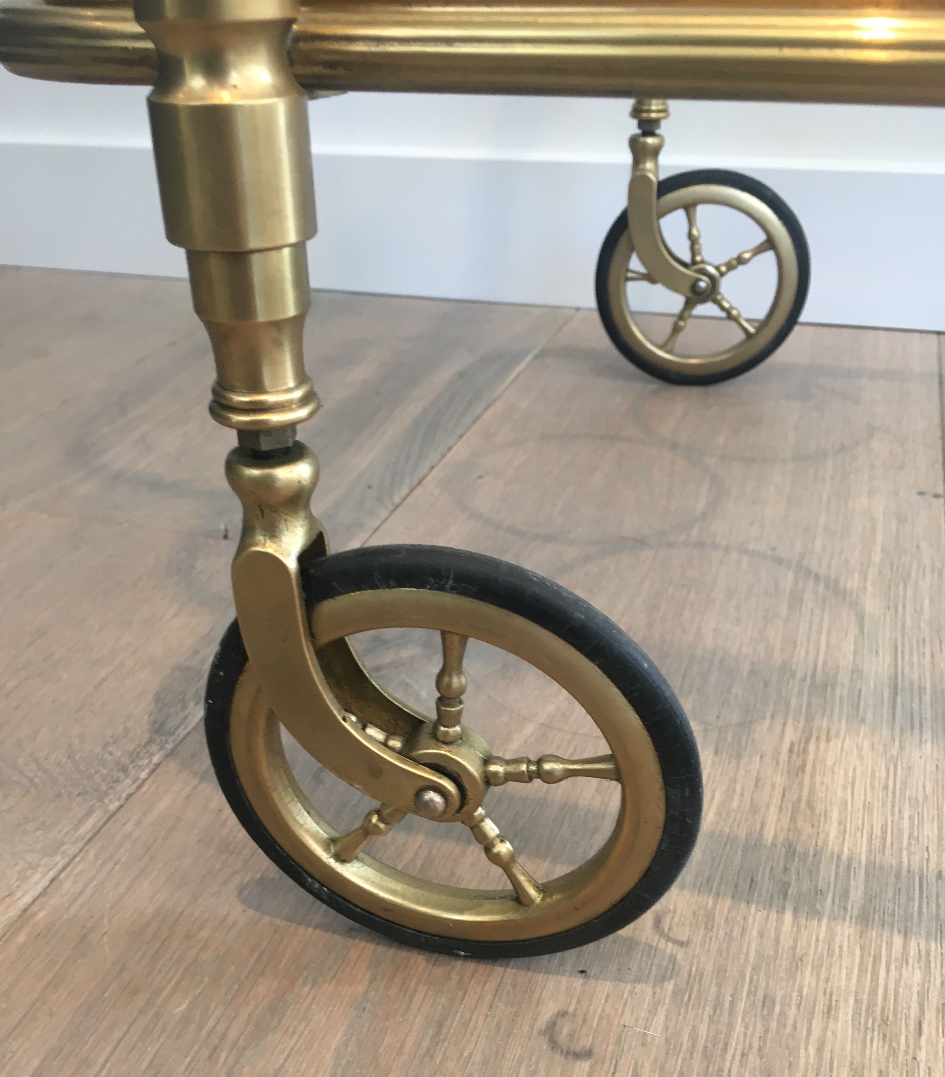 Neoclassical brass rolling table from Maison Baguès