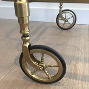 Neoclassical brass rolling table from Maison Baguès
