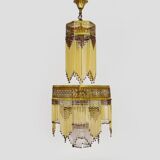 Art Nouveau style bronze chandelier with yellow and mauve pendants, 11 lights. 1960s