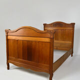 Art Nouveau twin beds in carved solid oak, France, circa 1910