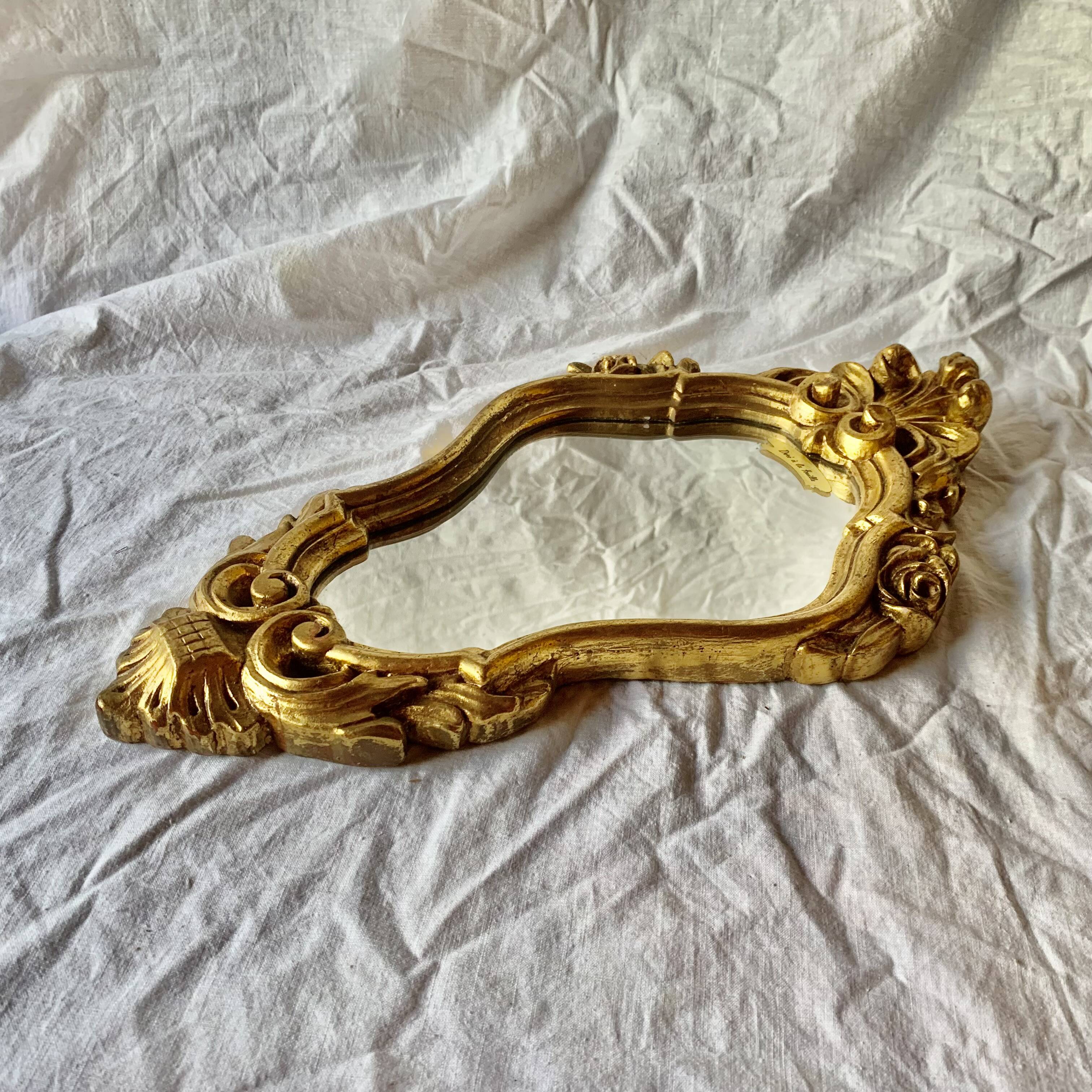 Vintage gold leaf resin wall mirror
