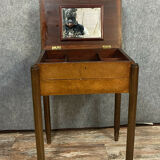 Art Deco period worker in amboine and mahogany magnifying glass