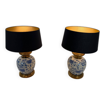 Pair of porcelain lamps with Chinese-style decorations and brass.