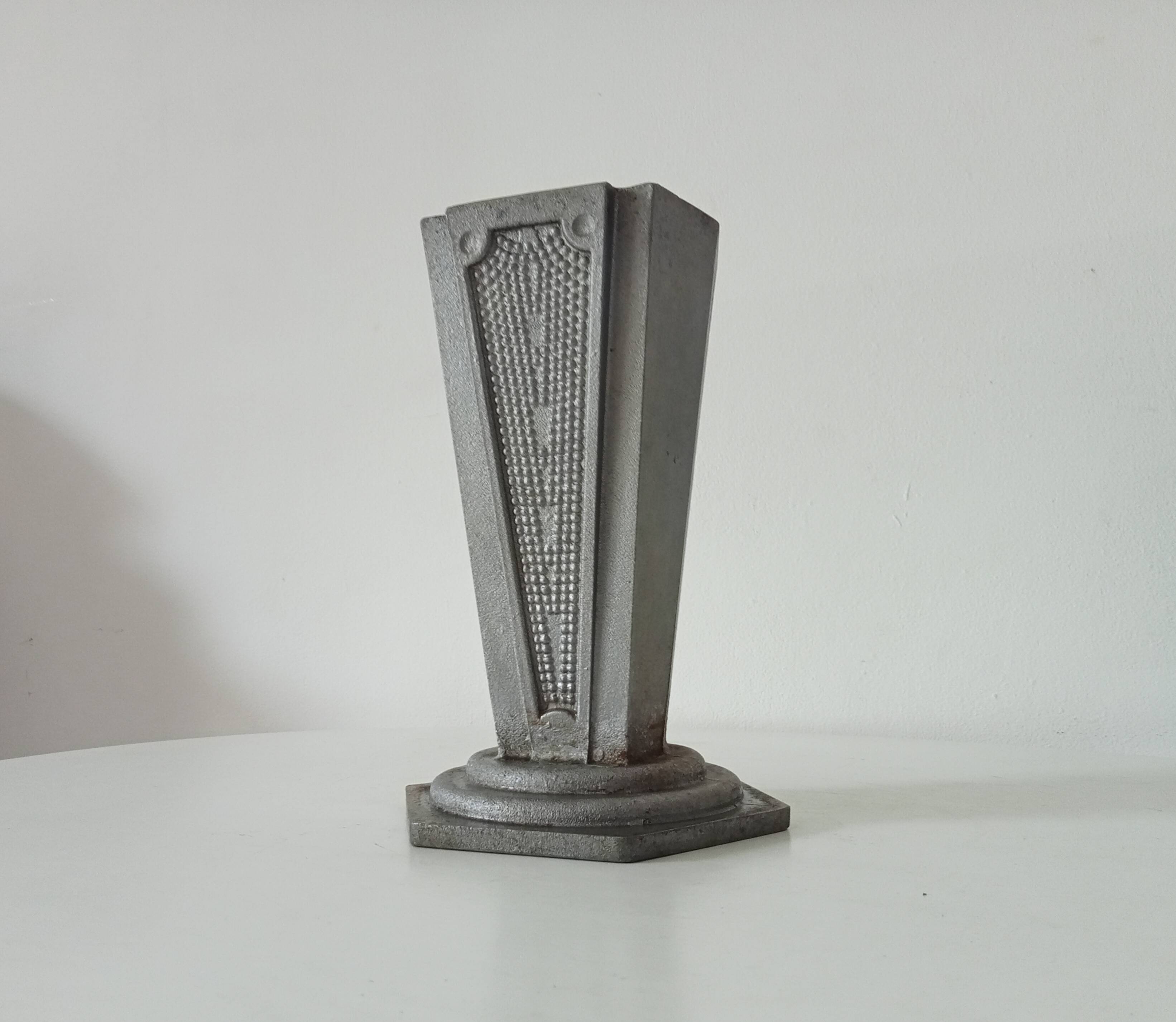 Old art deco vase in cast aluminum